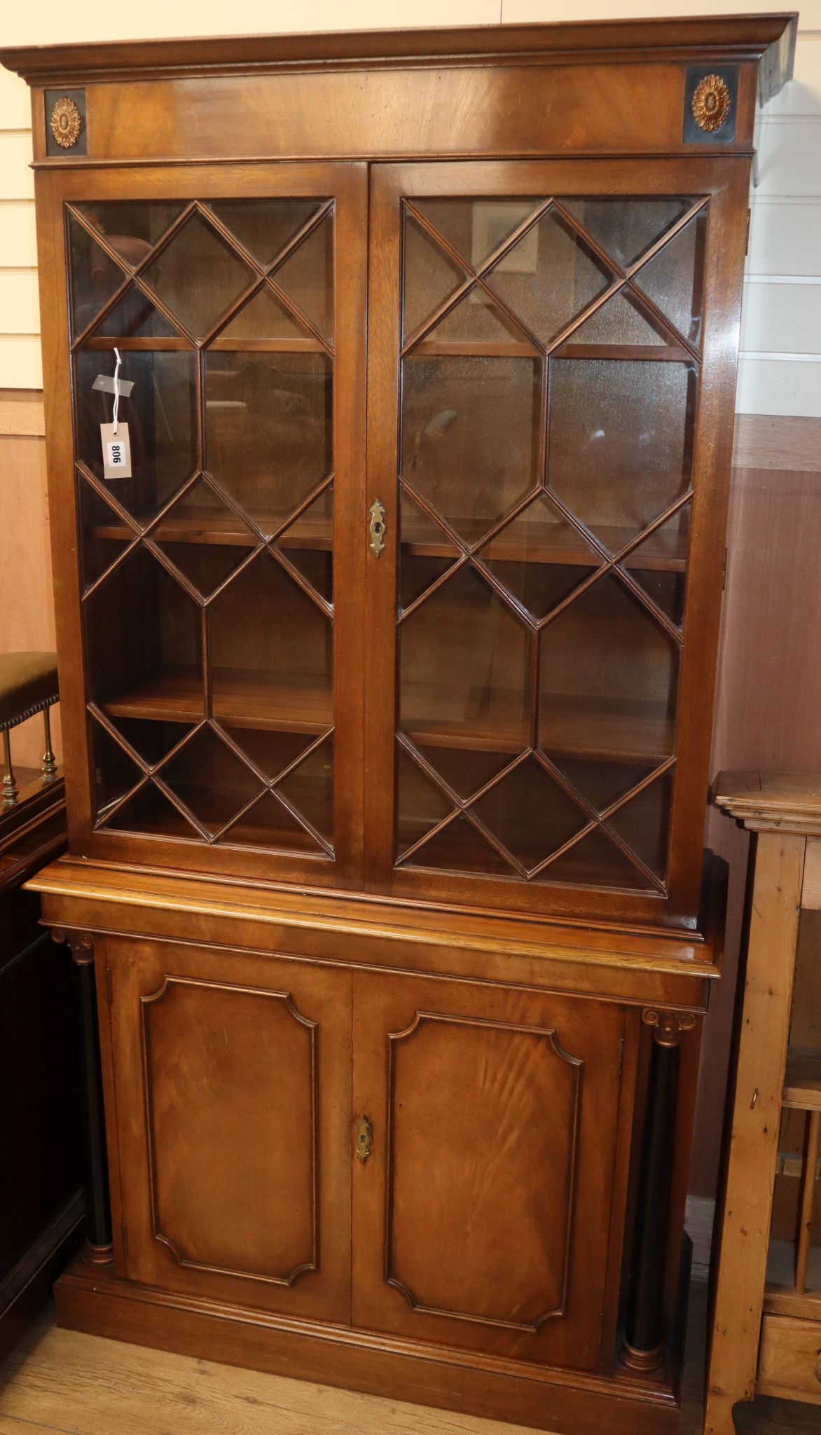 A reproduction mahogany bookcase W.94cm
