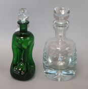 A Holmegaard green glass decanter and stopper and a Scandinavian style heavy glass decanter and