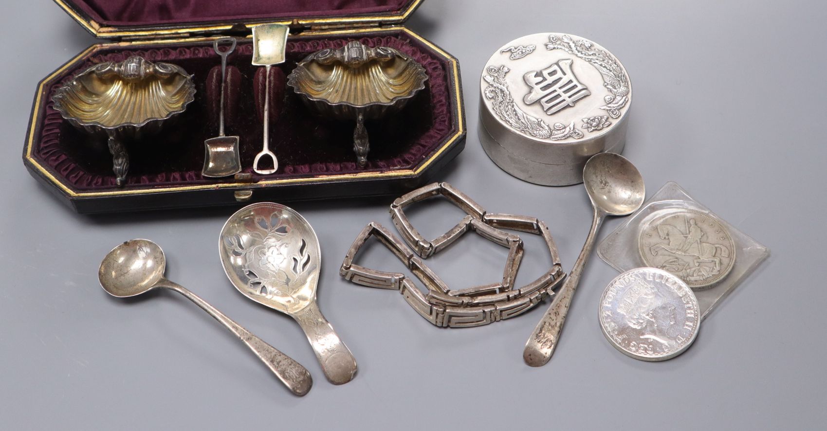 A cased pair of Victorian silver shell shaped salts and other items including a George III silver