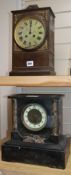 An early 20th century French copper cased mantel clock and a Victorian black slate mantel clock