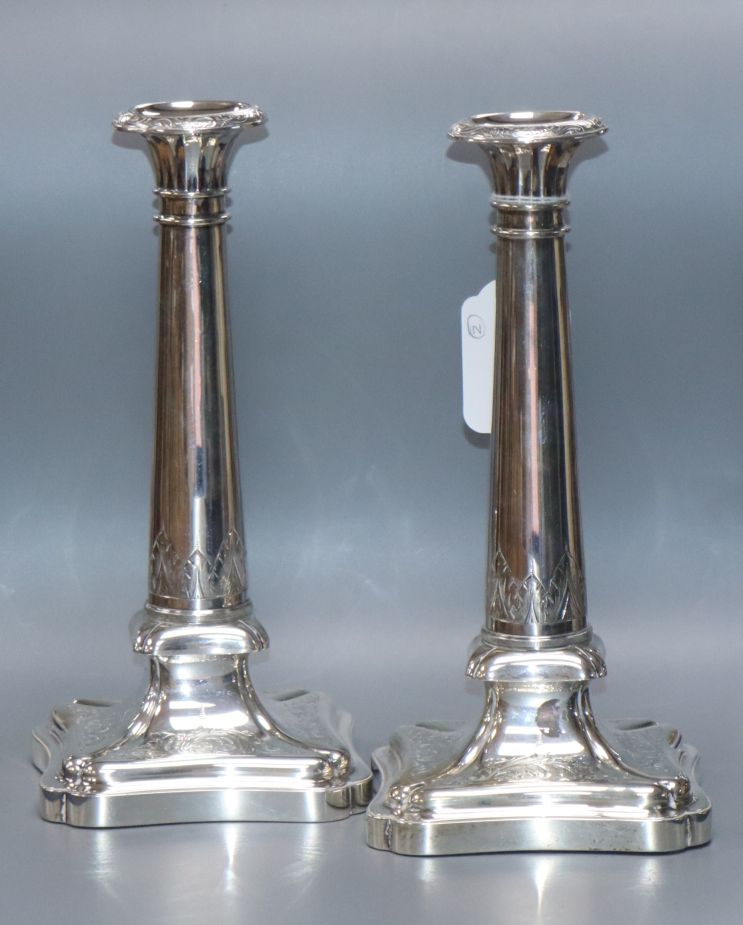 A pair of 19th century Dutch engraved white metal candlesticks, by Bennewitz, weighted, 23.4cm.