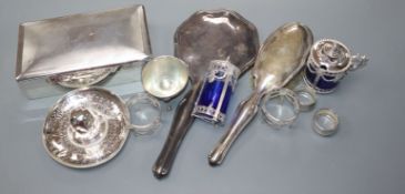 A silver cigarette box and other mixed white metal items including mirror, brush , condiments etc.