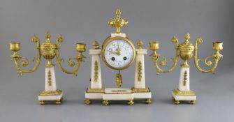 A Louis XVI style white marble and gilt-bronze garniture de cheminee, the portico-style clock with