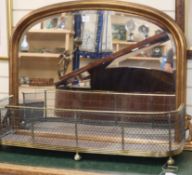 A Victorian style overmantel mirror and a brass mesh fender, mirror W.124cm