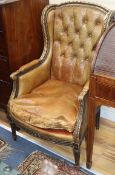 A 19th century French parcel gilt tan leather fauteuil