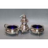 A 1970's silver three piece condiment set, Birmingham, 1979.