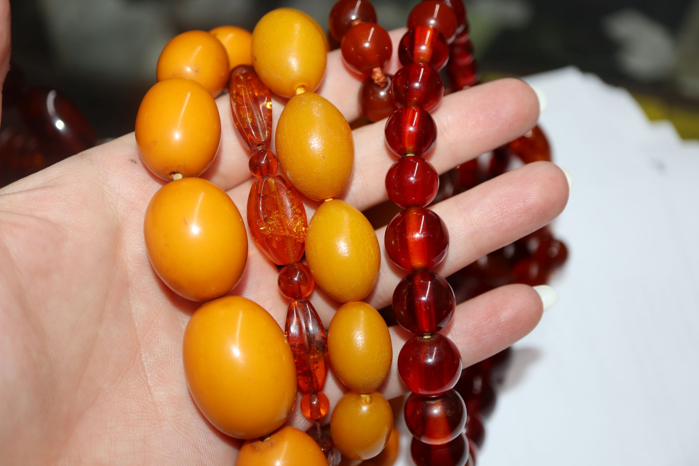 A quantity of amber and faux amber bead necklaces. - Image 4 of 8