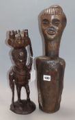 A West African hardwood figure of a hunter and another tribal figure tallest 45cm