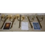 A set of five French Louis XVI brass 'rope and tassel' design two-branch wall lights
