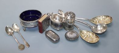 A pair of silver berry spoons and soup spoon, three silver condiments, silver sovereign case and