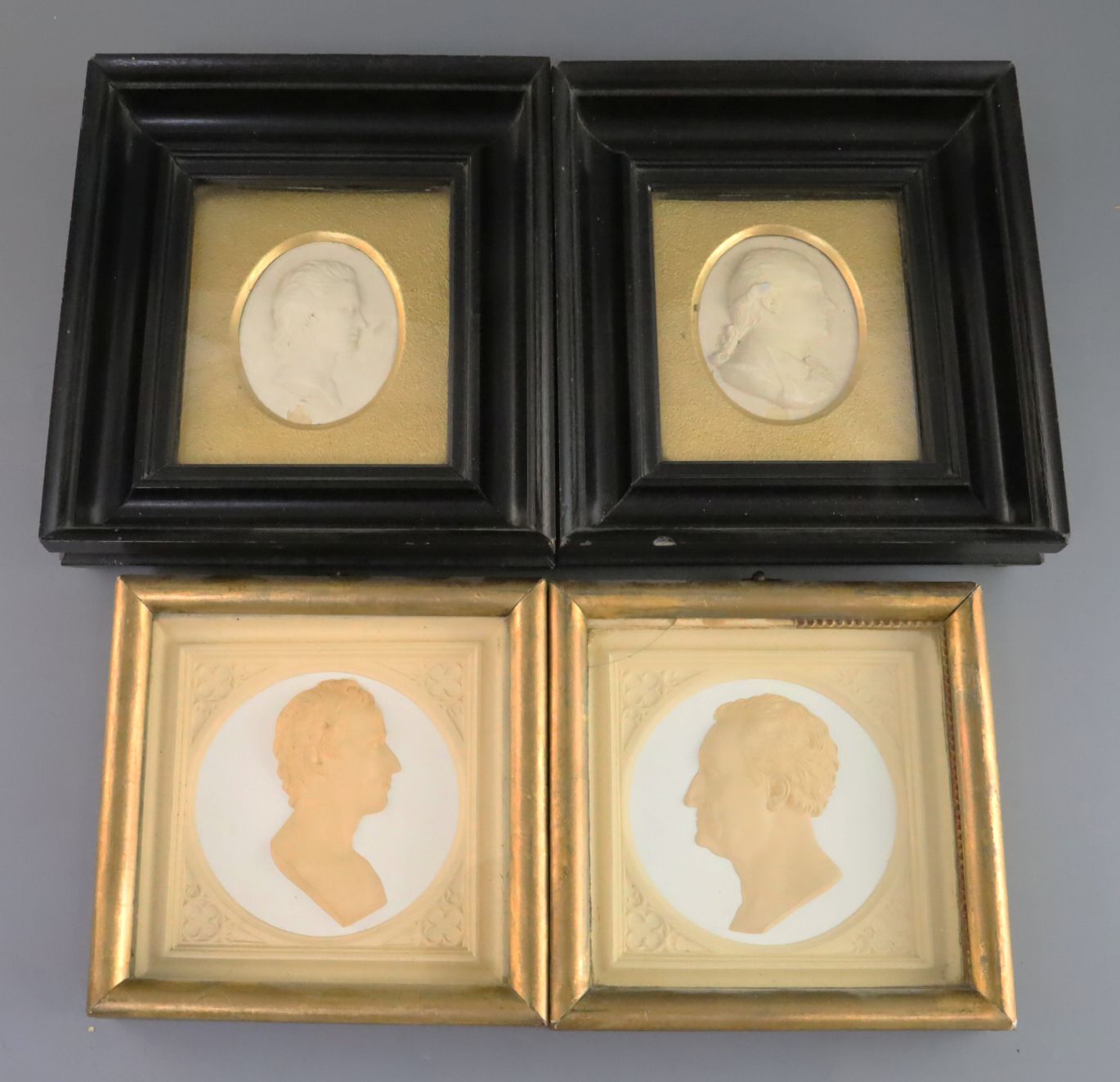 A pair of early Victorian plaster relief portrait plaques of Keates and Morot, retailed by
