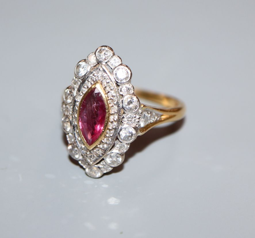 A modern Victorian style 18ct gold, ruby and diamond cluster marquise shaped dress ring, size L/M.