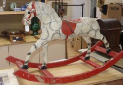 A vintage Stred rocking horse length 107cm