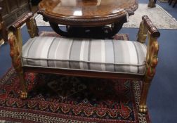 An Empire style parcel-gilt window seat W.106cm