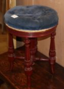 A Victorian style revolving piano stool W.36cm