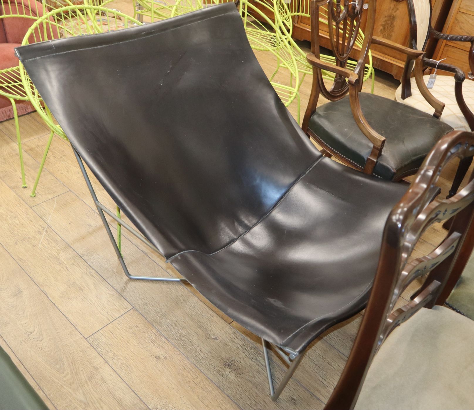 A retro leather and steel framed butterfly chair