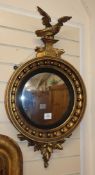 A Regency-style gilt convex mirror W.46cm