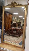 A Victorian giltwood and gesso wall mirror H.238cm approx.