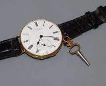 A yellow metal fob watch with Roman dial and subsidiary seconds by John Neal, now converted to a