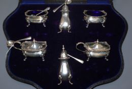 A cased George V silver six piece condiment set, E.S. Barnsley & Co, Birmingham, 1912.