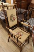 A Victorian tapestry upholstered turned framed armchair