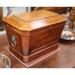 An early 19th century mahogany sarcophagus wine cooler W.75cm