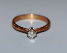 A modern 18ct gold and diamond solitaire ring, size N.
