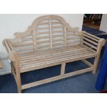 A Lutyens style teak garden bench W.165cm