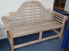 A Lutyens style teak garden bench W.165cm