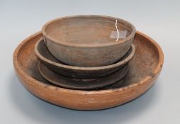 Two Chinese Straits brown-glazed bowls and two dishes