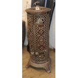 A cast iron conservatory heater with pierced side H.79cm