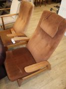 A pair of Gimson and Slater 'rock'n'rest' teak reclining chairs (one a.f.)