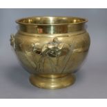 A Chinese bronze jardiniere, cast with Birds of Paradise and reeds height 24cm