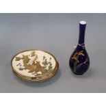 Three Satsuma plates and a blue and white gilt vase Vase H.23cm