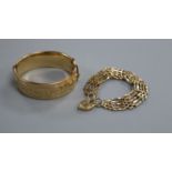 A 9ct gold gatelink bracelet with padlock clasp and a 1/5th - 9ct gold engraved bangle, bracelet