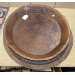 Two large hardwood circular trays largest diameter 60cm