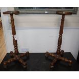 A pair of 19th century continental fruitwood candle stands H.82cm