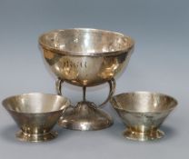 A modern Arts & Crafts style planished silver bowl on stylised supports by Francis Howard Ltd and