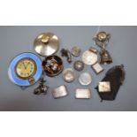 A small collection of silver and white metal items including enamel desk clock, tortoiseshell