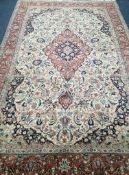 A Kashan ivory ground carpet 315 x 194cm