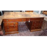 A late 19th century mahogany partner's desk fitted drawers and cupboards L.182cm