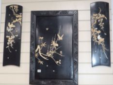 A Japanese Meiji shibayama panel (framed) and a pair of similar shaped smaller panels, variously