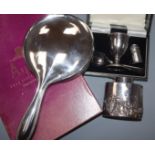A late Victorian silver caddy(a.f.), a cased silver two piece christening set, silver hand mirror