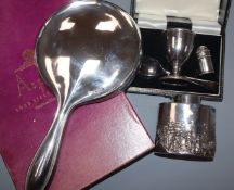 A late Victorian silver caddy(a.f.), a cased silver two piece christening set, silver hand mirror