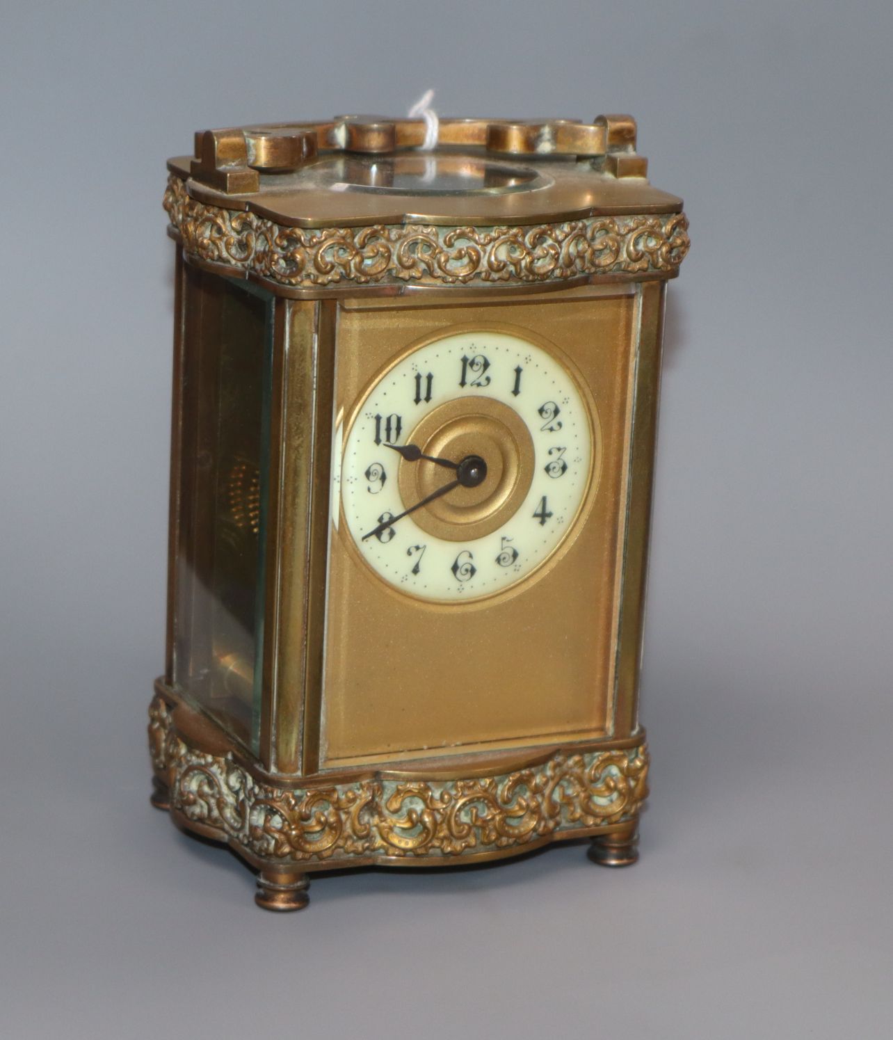 An early 20th century French brass carriage timepiece