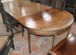 A George III mahogany 'D' end extending dining table W.300cm extended