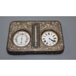 An Edwardian repousse silver mounted combination pocket watch, barometer and thermometer desk