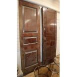 Four 19th century French mahogany internal doors H. approx. 232cm