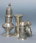 A late Victorian repousse silver sugar caster, Sheffield, 1895 and three later silver casters, 19.