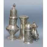 A late Victorian repousse silver sugar caster, Sheffield, 1895 and three later silver casters, 19.